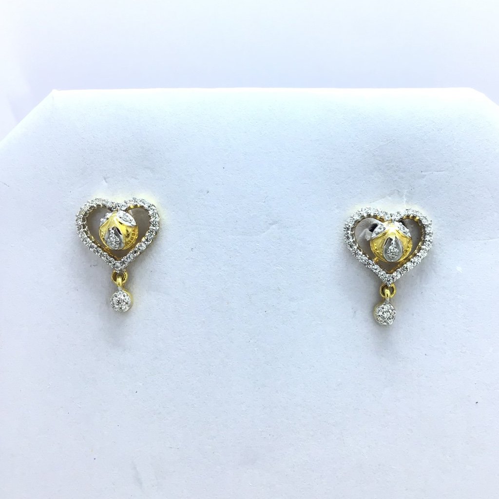 designing heart fancy gold earrings